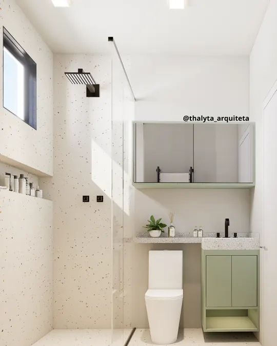 Banheiro Contemporâneo: Granilite, verde-sálvia e metais pretos em um banheiro claro e funcional.